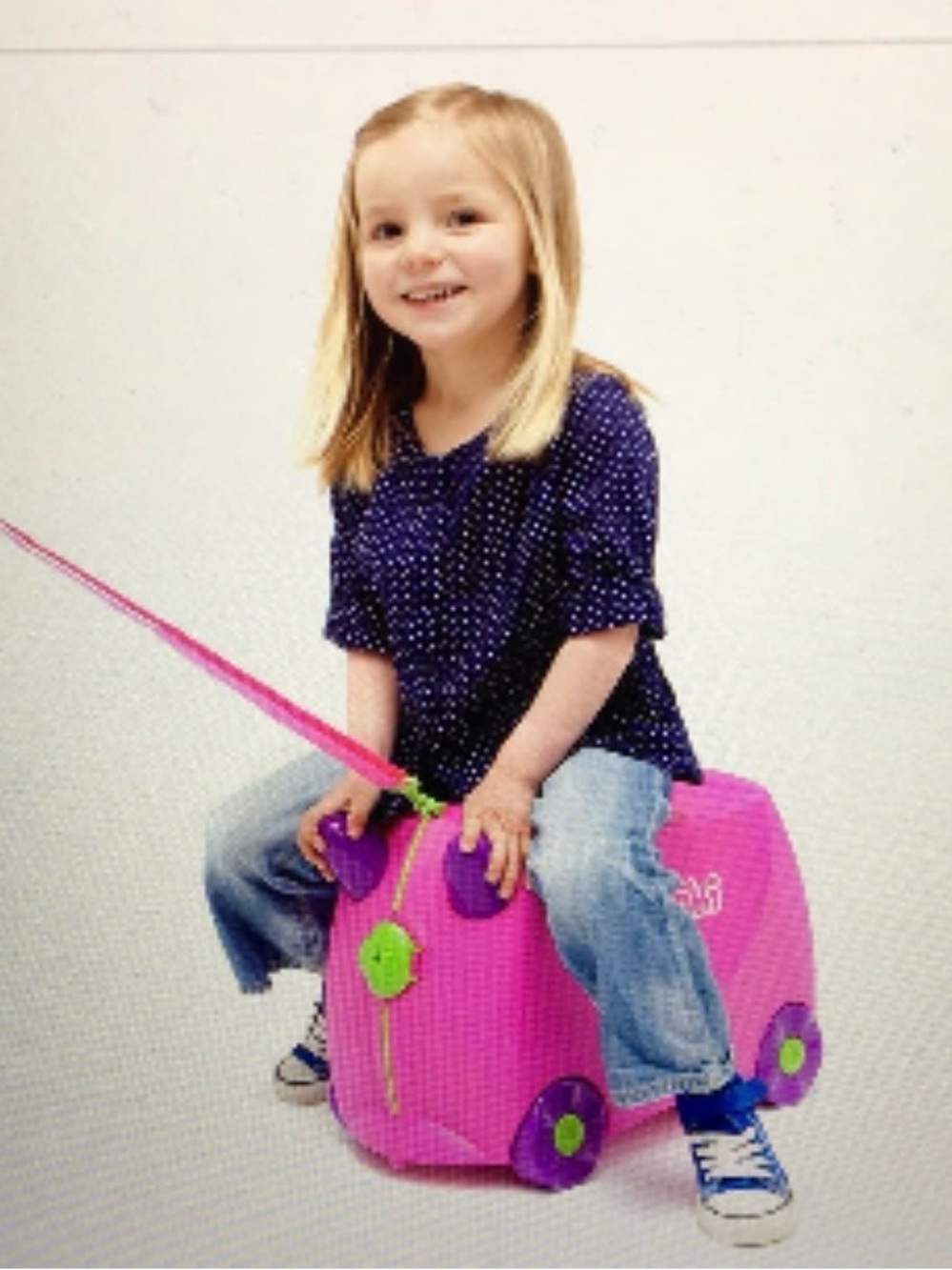 Trunki Children's Pink Ride-On Suitcase with Pull Strap pink